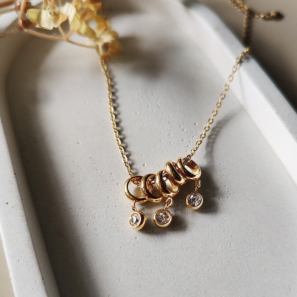 Golden Orbit Drop Necklace